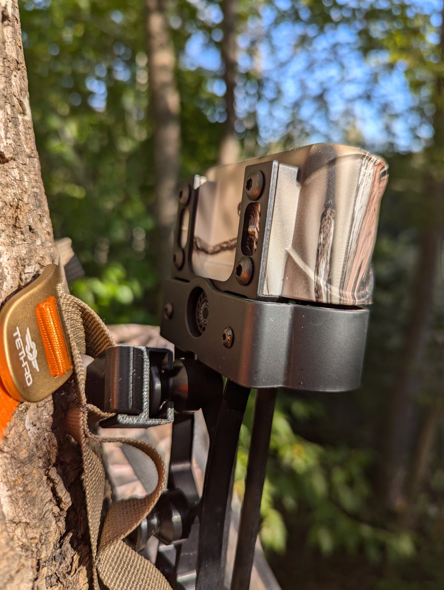3D Hunting Solutions archery quiver caddy for Mathews SpiderClaw and LowPro bow accessories, shown mounted on a bow.