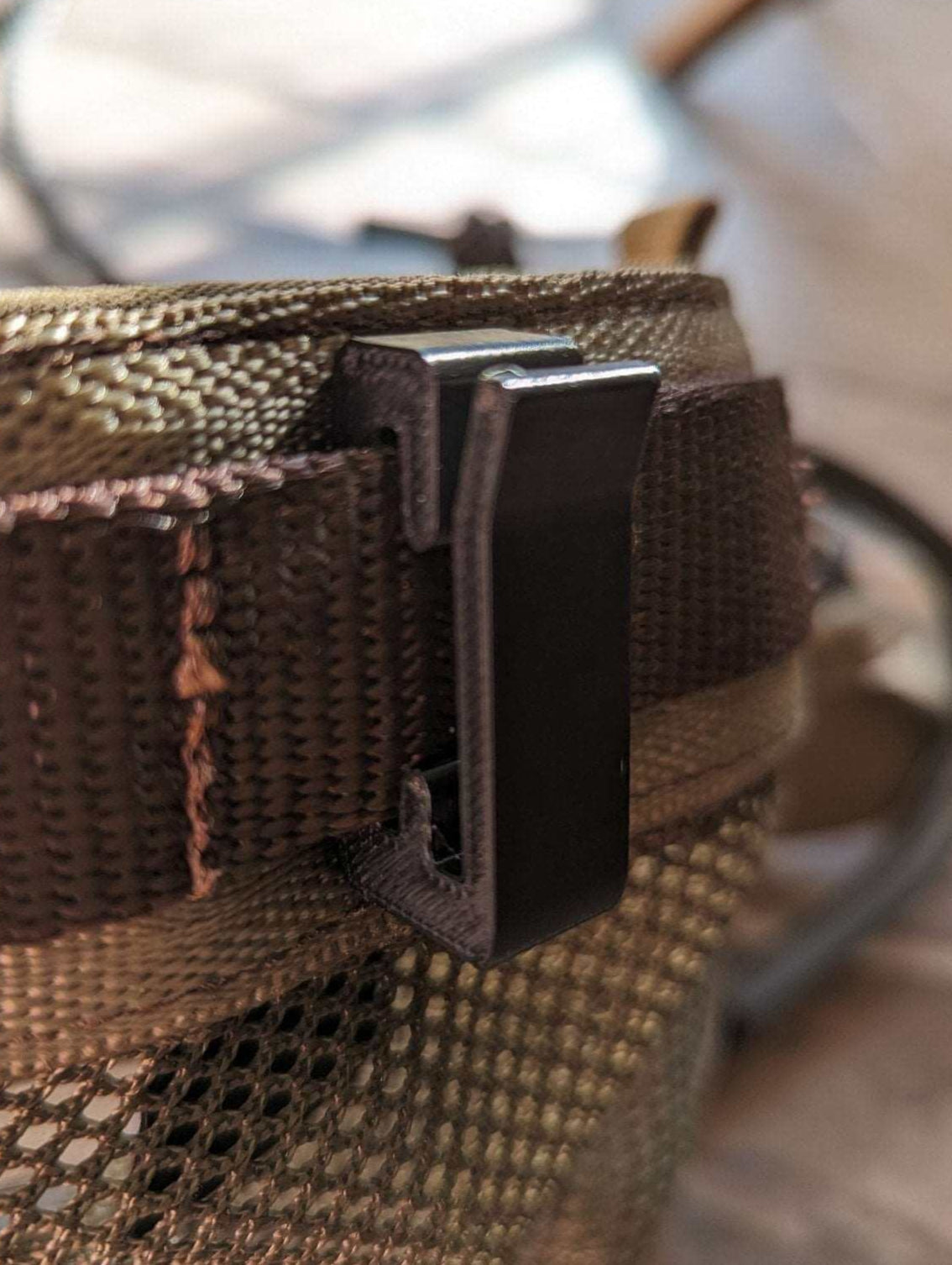3D Hunting Solutions Molle Hook and Hanger for tactical gear and outdoor equipment attachment.