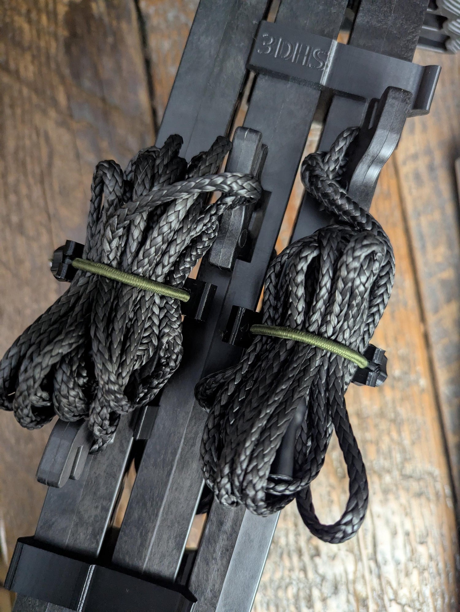 3D Hunting Solutions climbing stick attachment bundler with multiple straps and hardware for secure tree climbing support