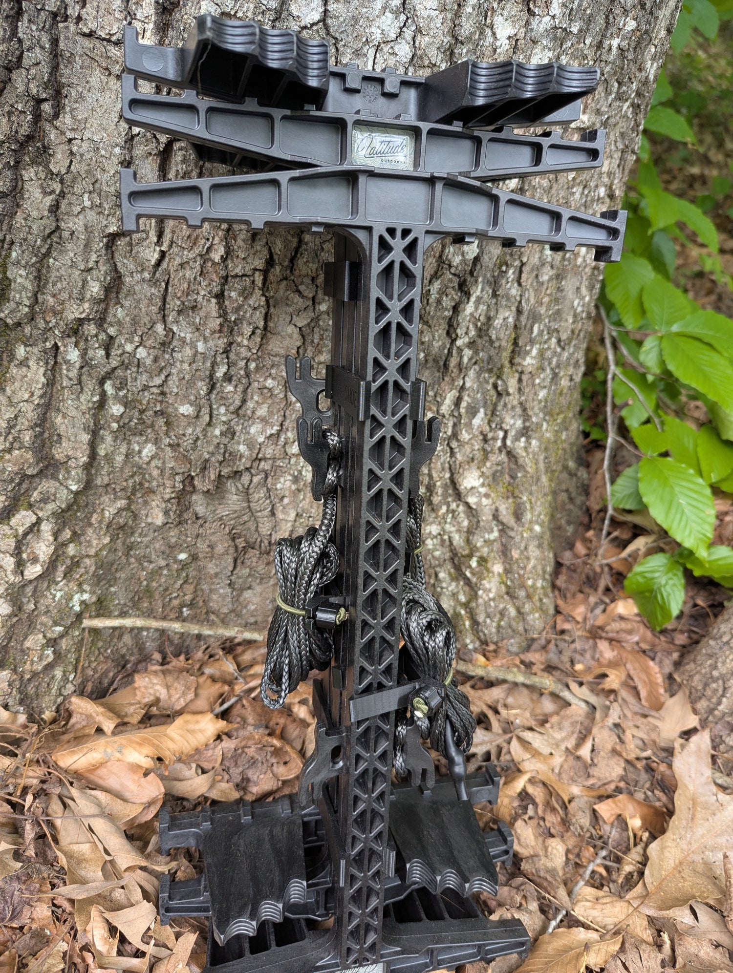 3D Hunting Solutions Latitude Carbon SS climbing stick wranglers management system with two climbing sticks stacked for easy transport