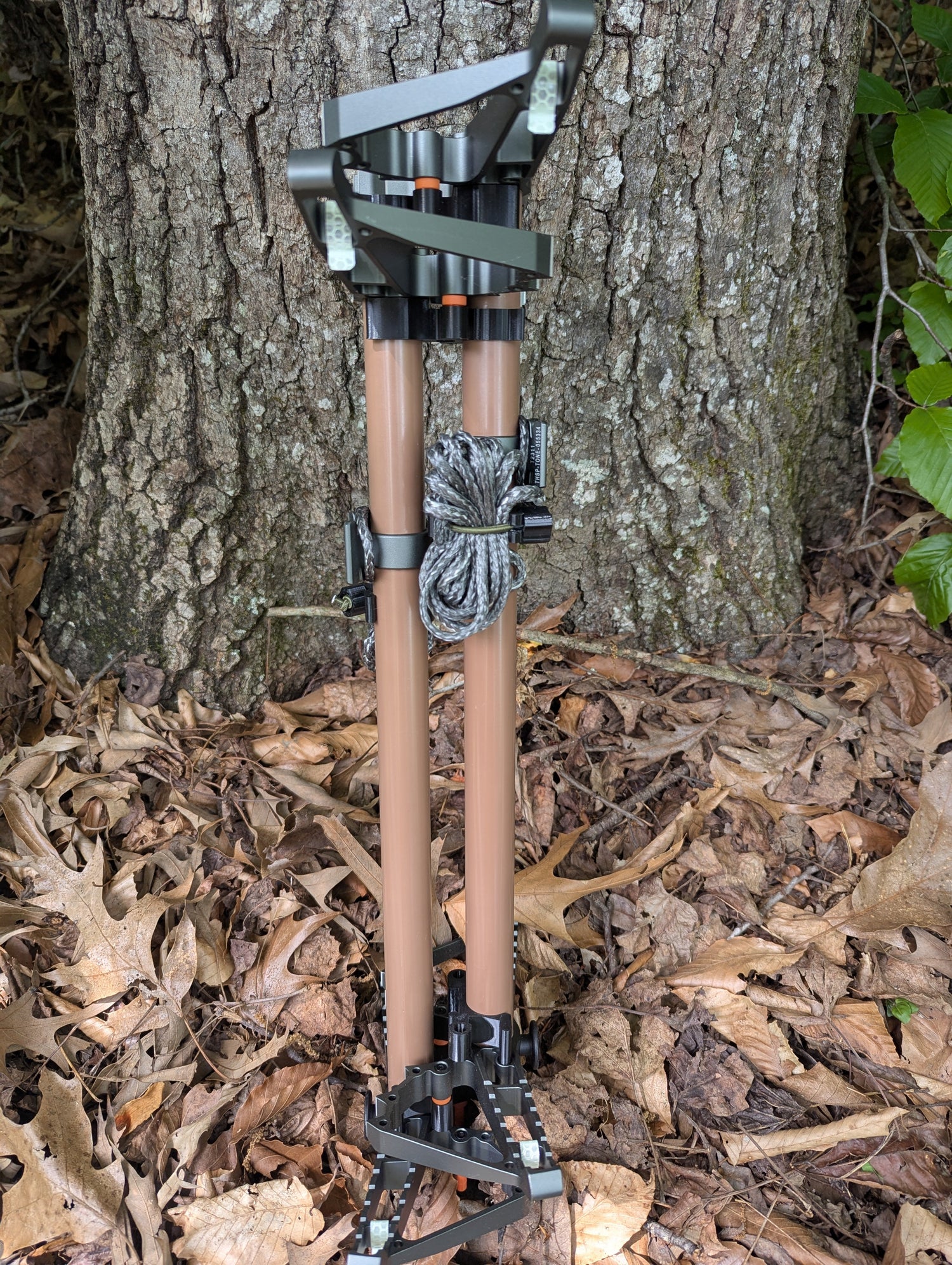 3D Hunting Solutions Tethrd One Stick Wranglers climbing stick stacking system with two climbing sticks for efficient tree stand setup