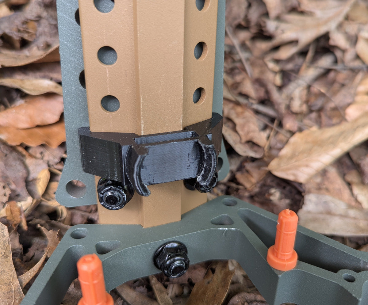 Set of Tethrd Skeletors Stick Wranglers by 3D Hunting Solutions for climbing stick management, featuring two stacked climbing sticks.