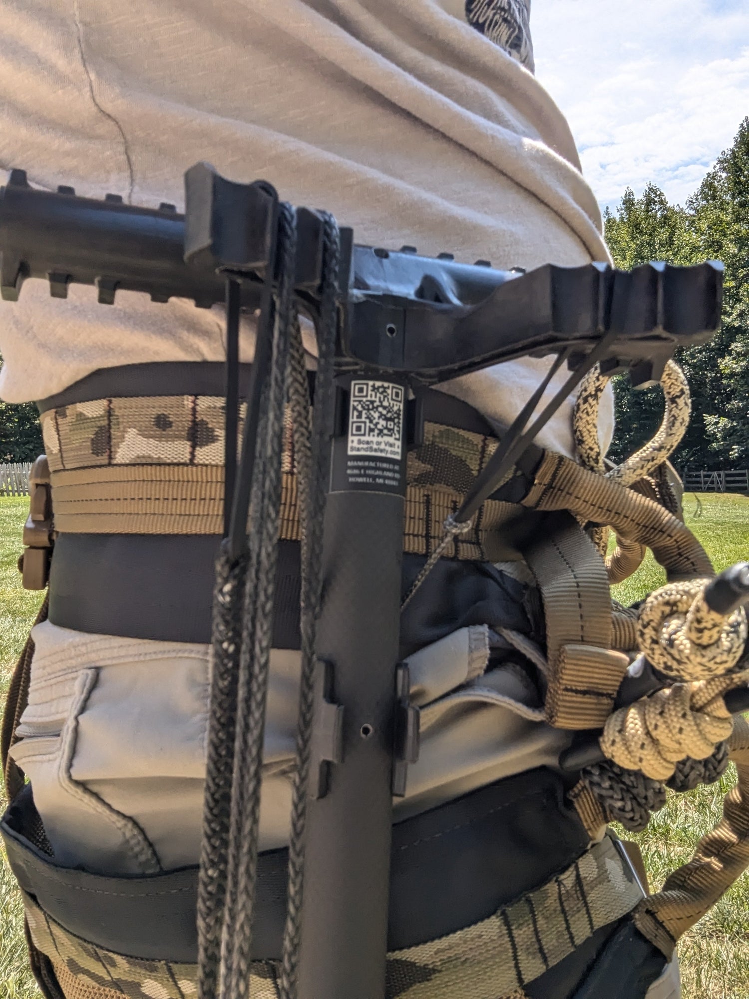 TreeStyx Synergy Stick Caddy for saddle hunting, 3D Hunting Solutions climbing stick accessory, shown attached to climbing stick.