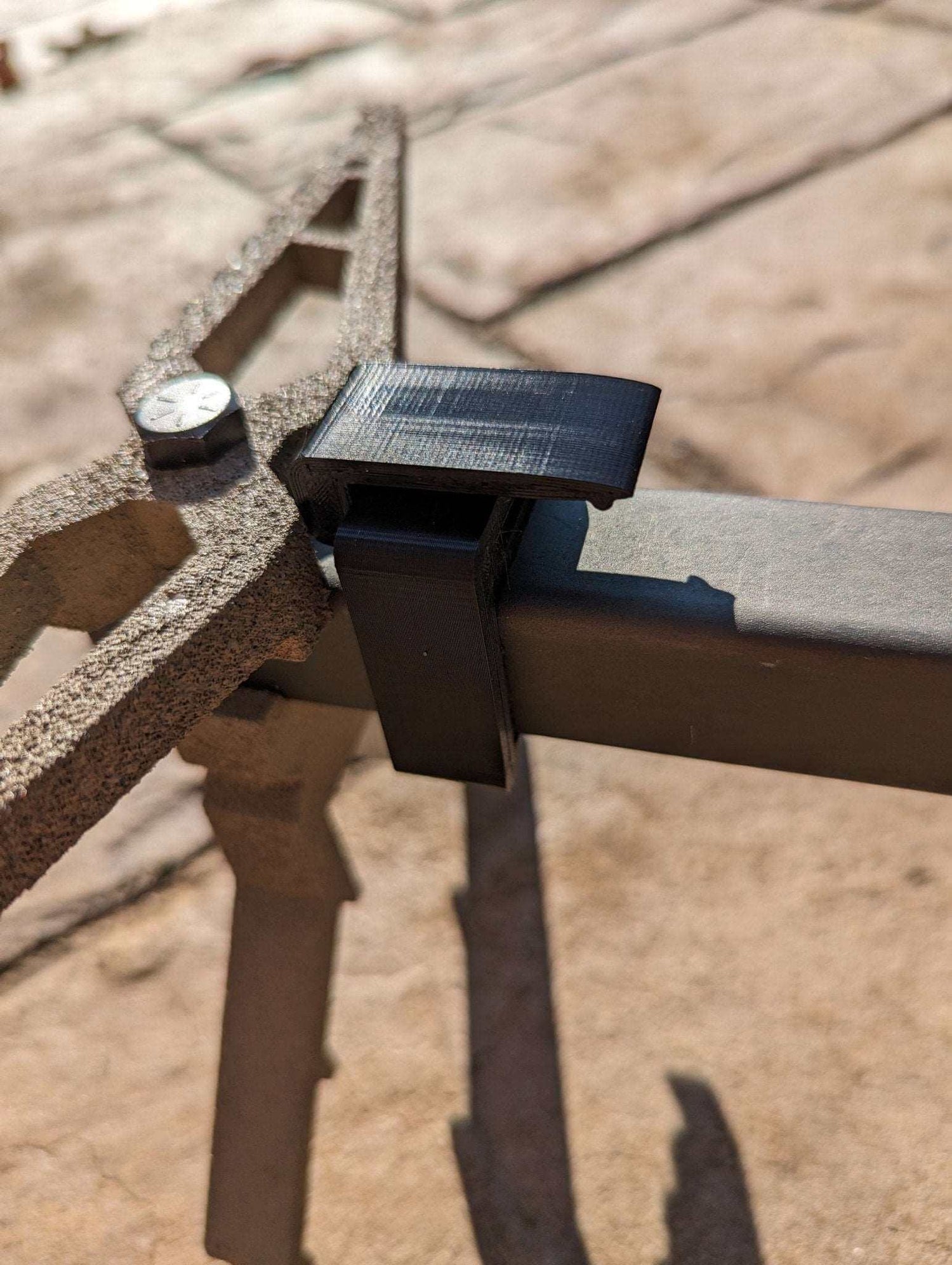 Climbing stick caddy for 1-inch square tubing, designed for saddle hunting, by 3D Hunting Solutions, shown attached to a climbing stick.