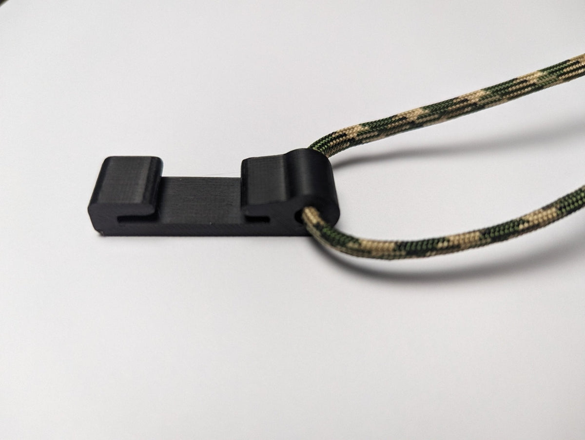 Rope MOLLE hanger from 3D Hunting Solutions with durable nylon rope and MOLLE attachment system for gear organization.