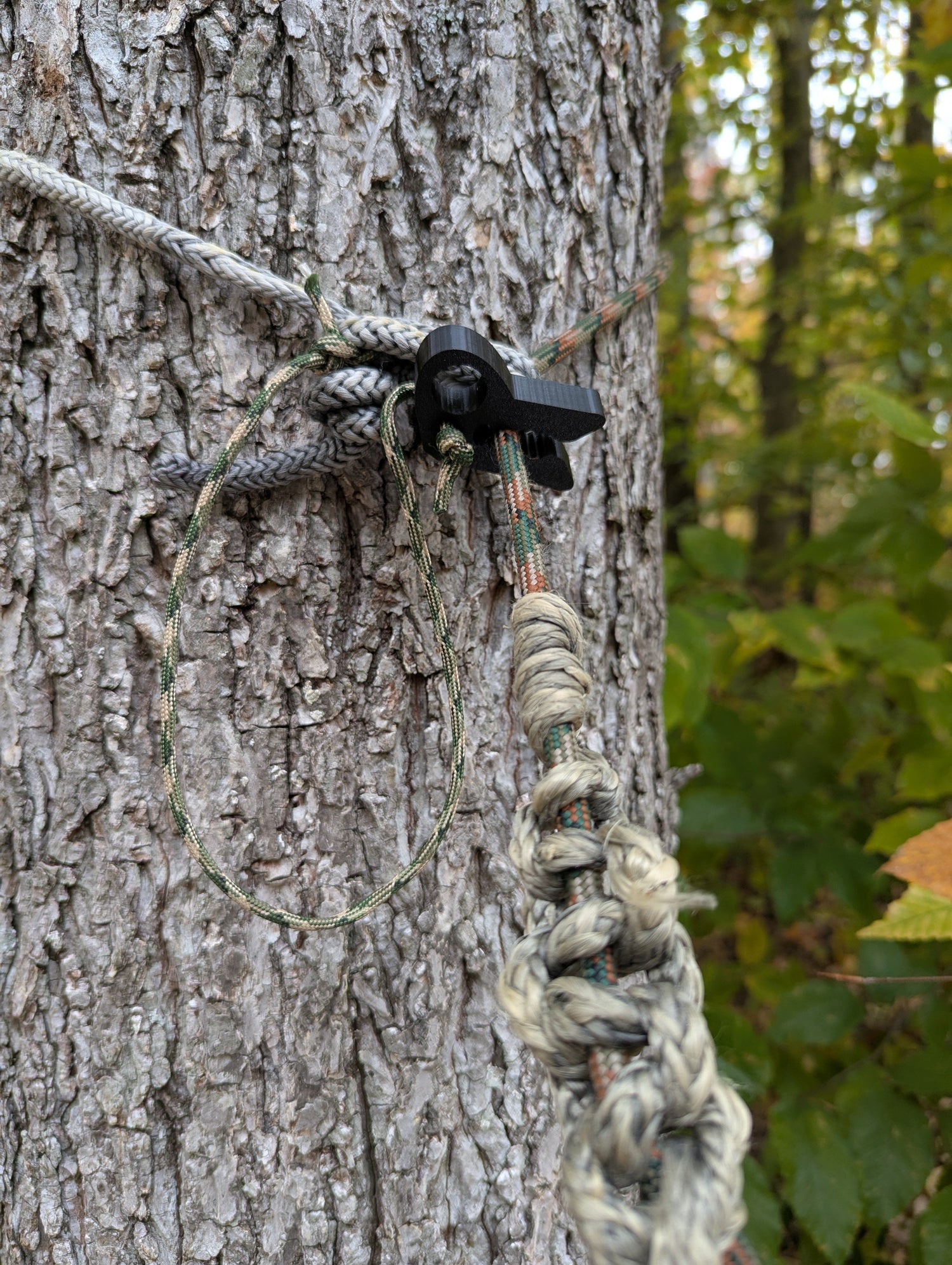 T-REX Tether Clip by 3D Hunting Solutions for mobile and saddle hunting, designed for secure one-sticking setup.