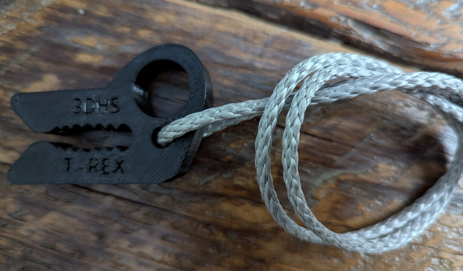 T-REX Tether Clip by 3D Hunting Solutions for mobile and saddle hunting, designed for one sticking and secure tethering.