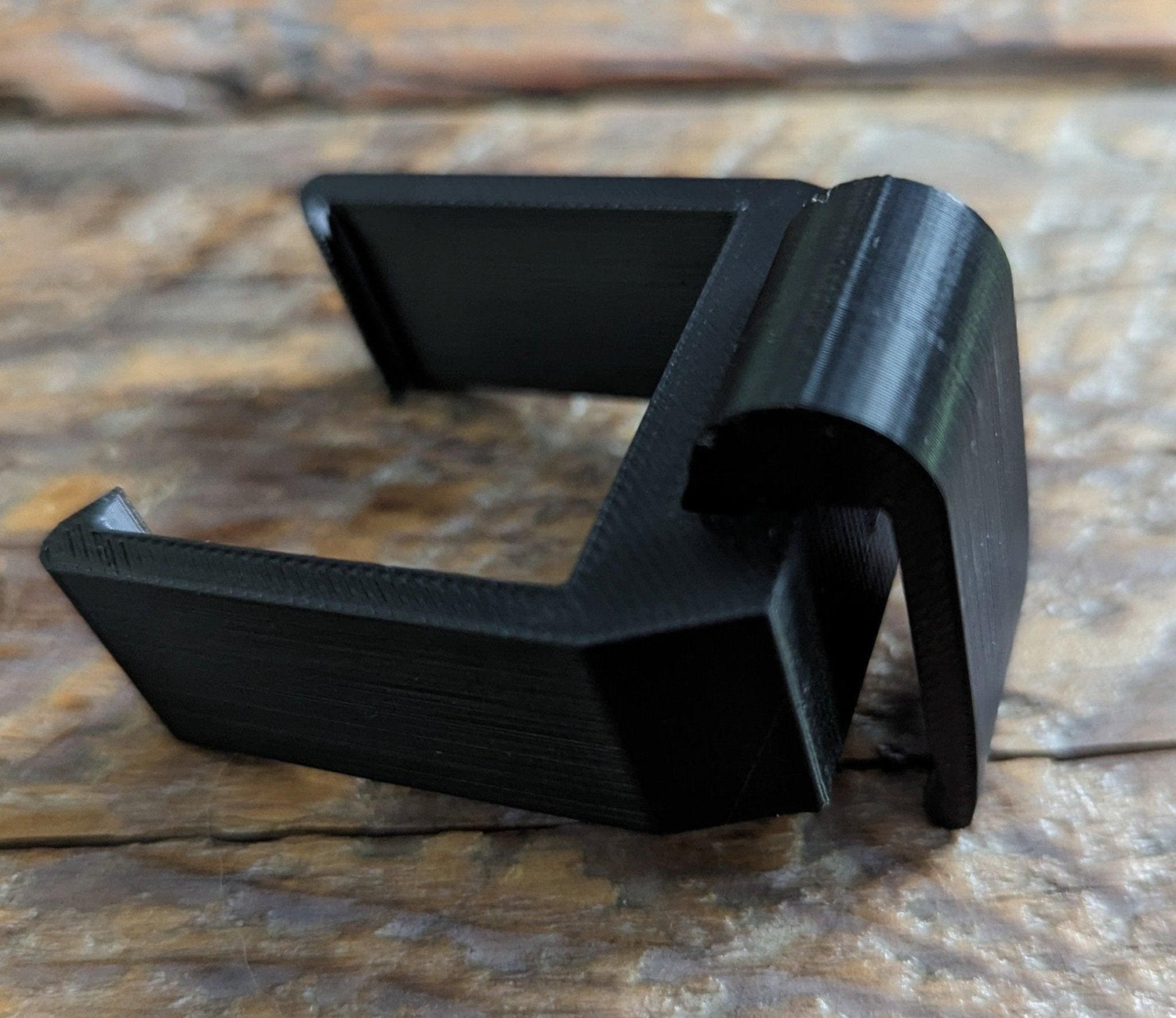 3D Hunting Solutions Saddle Platform Caddy for saddle hunting, shown attached to a tree for easy gear access.