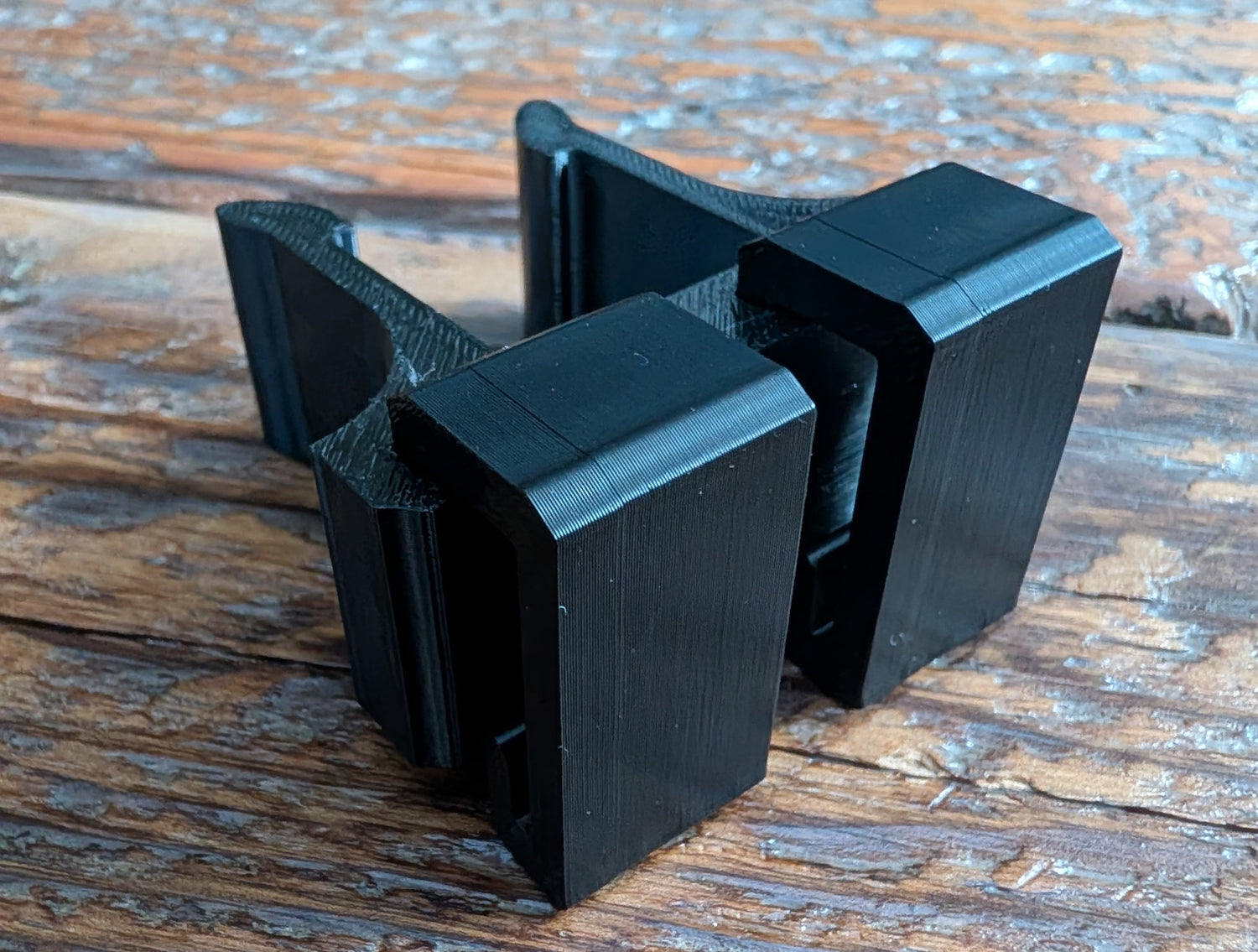 Climbing stick Molle caddy for 1-inch square tubing, designed for saddle hunting, by 3D Hunting Solutions, mounted on a hunting tree.