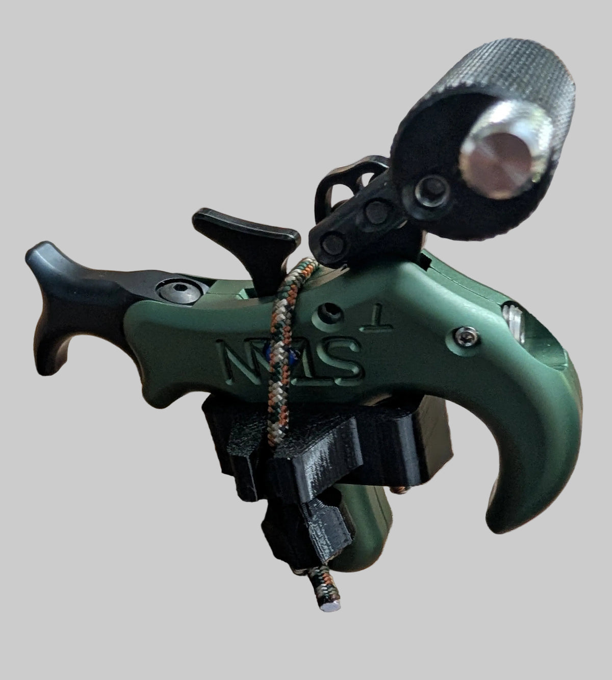 3D Hunting Solutions archery release stabilizer holster for thumb releases, shown attached to a bow for secure accessory storage
