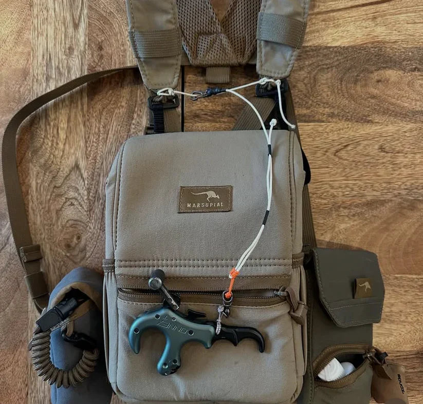 Bow Disciples Singlepoint Bino Pack Release Harness strap for secure archery gear attachment and quick release.