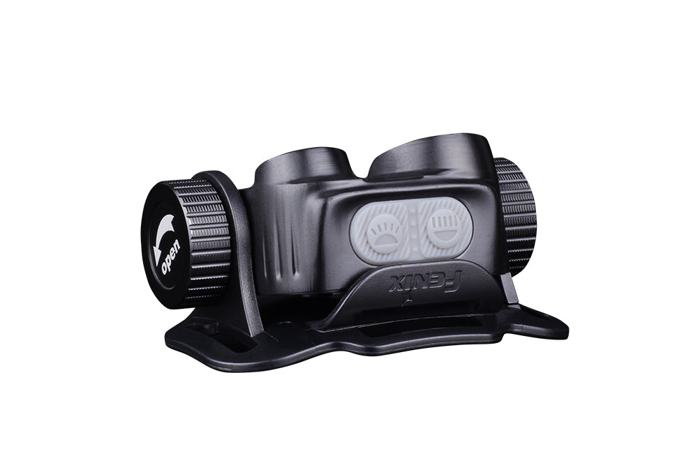 Fenix HM65R rechargeable LED headlamp with 1400 lumens showing the adjustable head strap and bright front light in use