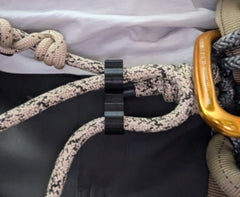 3D Hunting Solutions saddle bridge and rope caddy with rope, designed for secure storage and easy access during outdoor activities.