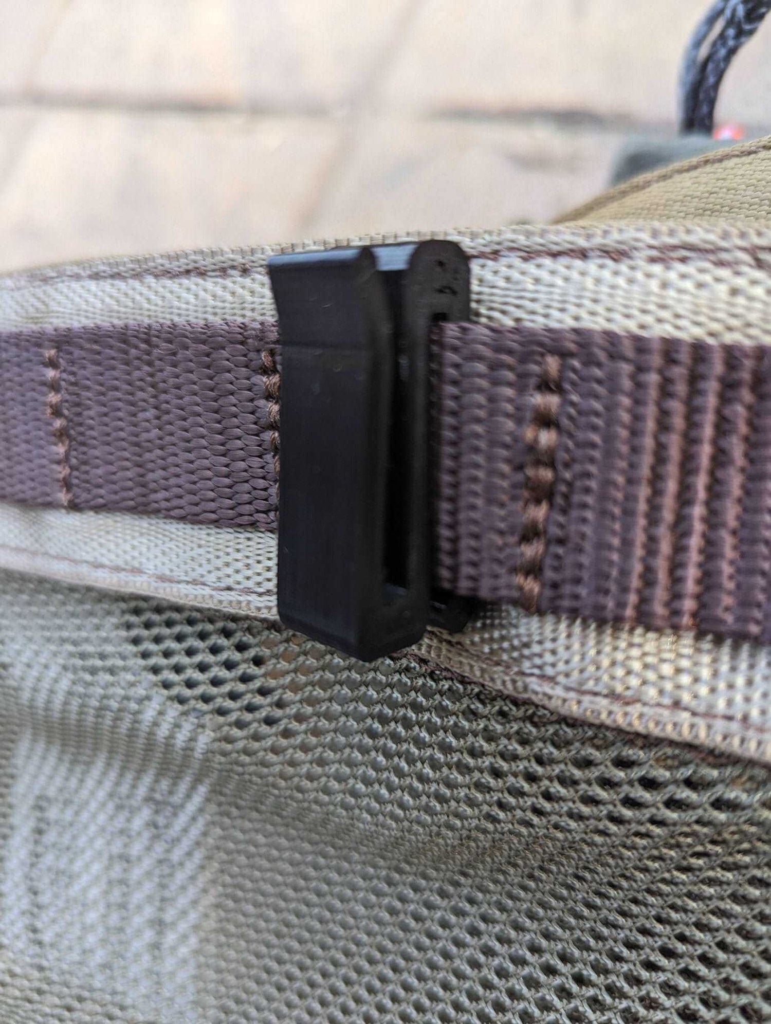 3D Hunting Solutions Molle Hook Hanger for tactical gear attachment, featuring durable metal construction and versatile mounting options.