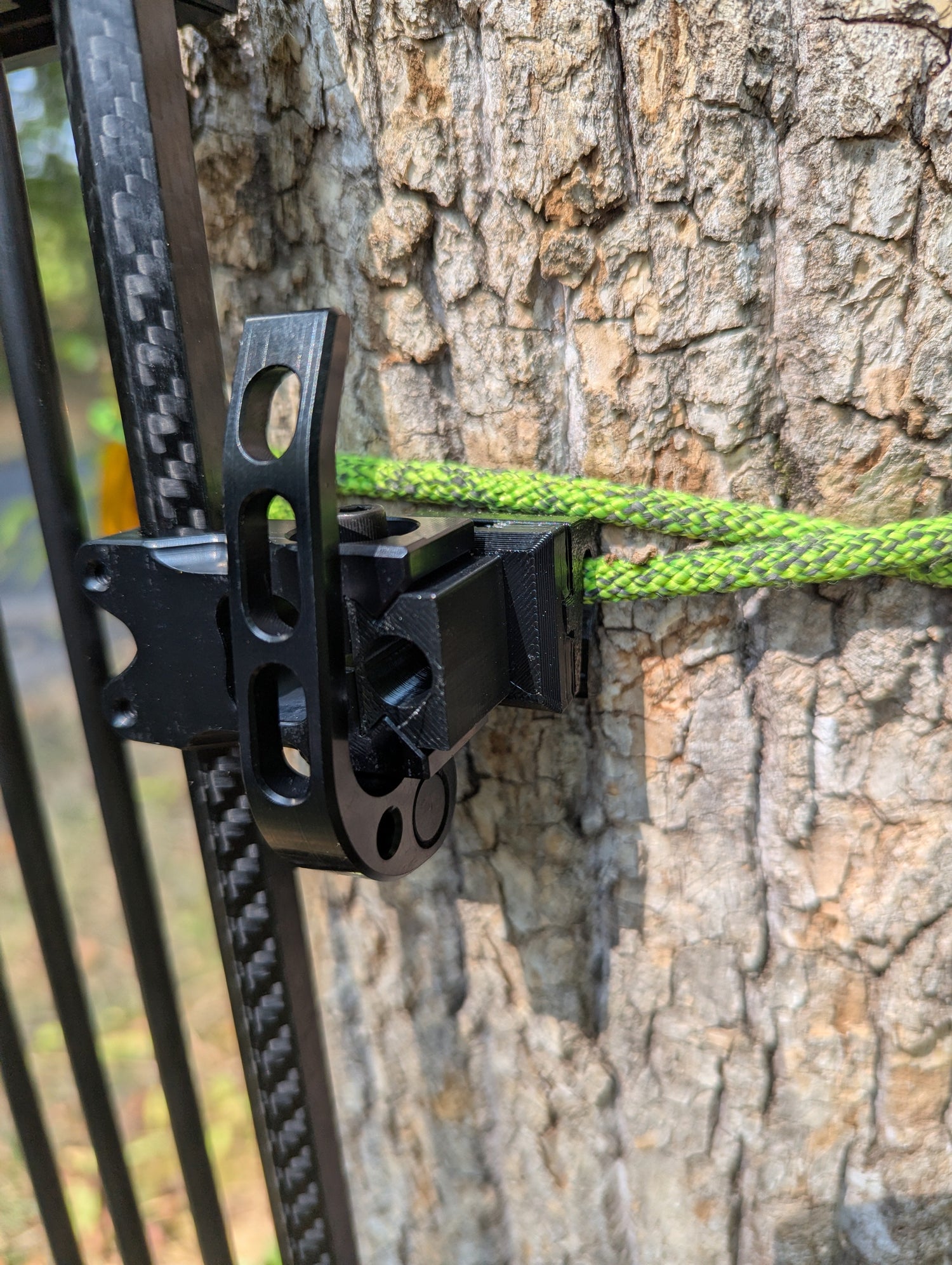 Tight Spot Archery Quiver Caddy by 3D Hunting Solutions attached to a bow, designed for easy arrow storage and quick access.