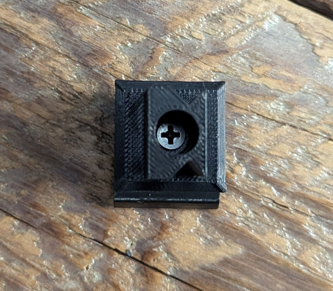 Close-up of the 3D Hunting Solutions Tight Spot Archery Quiver Caddy with MOLLE attachment system for bow accessories.