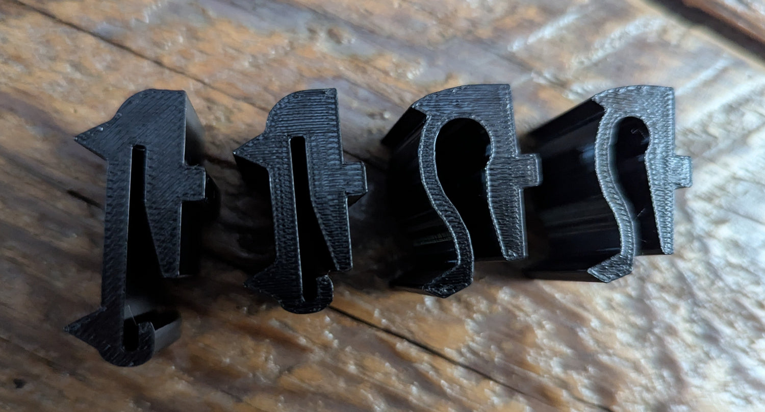 Molle Tight Spot Archery Quiver Caddy by 3D Hunting Solutions attached to a bow, designed for quick arrow access and organization