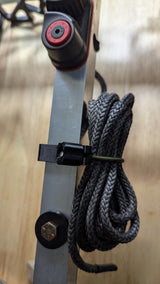 3D Hunting Solutions climbing stick attachment bundler showing sturdy metal components for secure tree climbing support