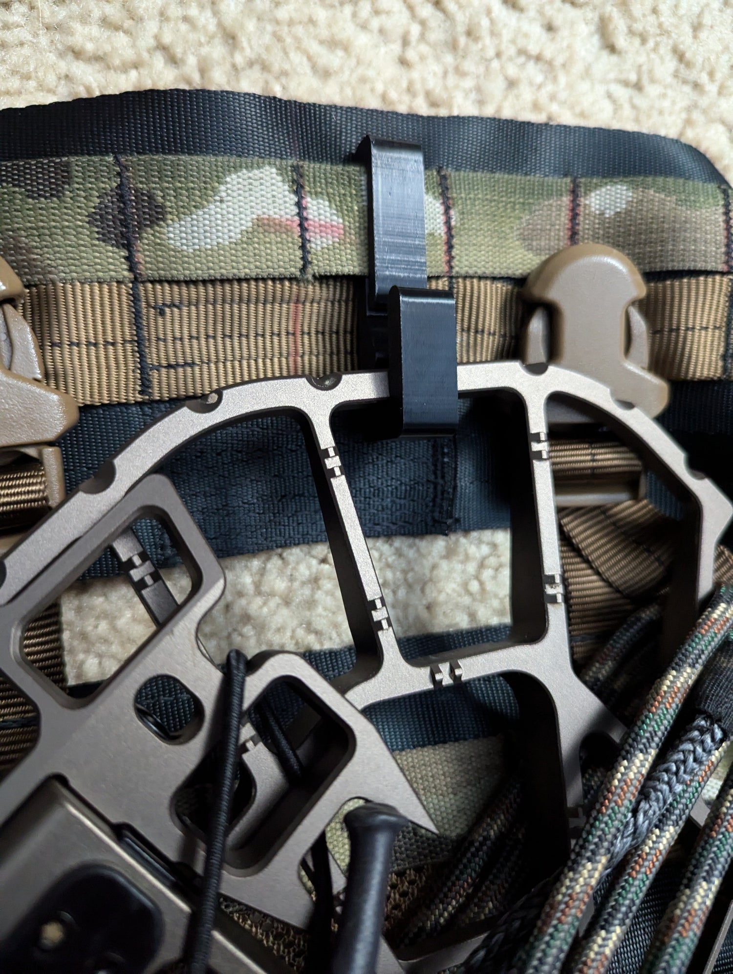3D Hunting Solutions saddle platform hanger for mobile hunting, lightweight and sturdy for secure gear support in outdoor activities.