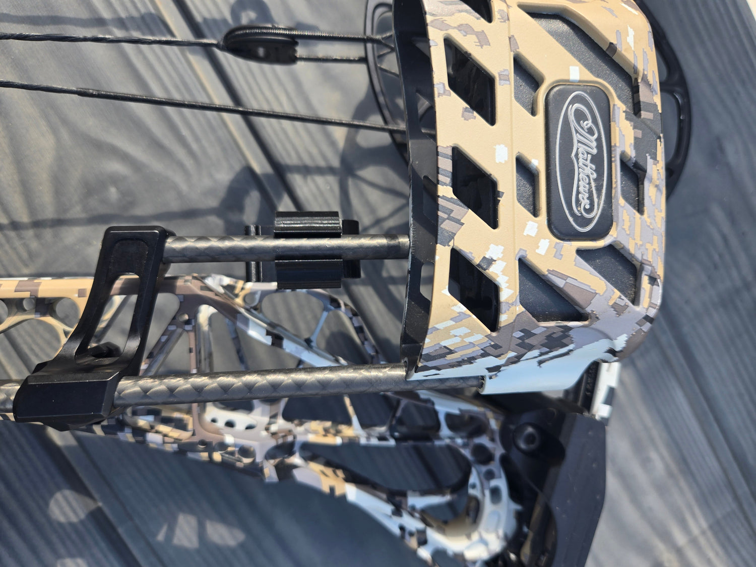 3D Hunting Solutions clip-on archery quiver hanger attached to a tree for easy arrow storage and quick access.