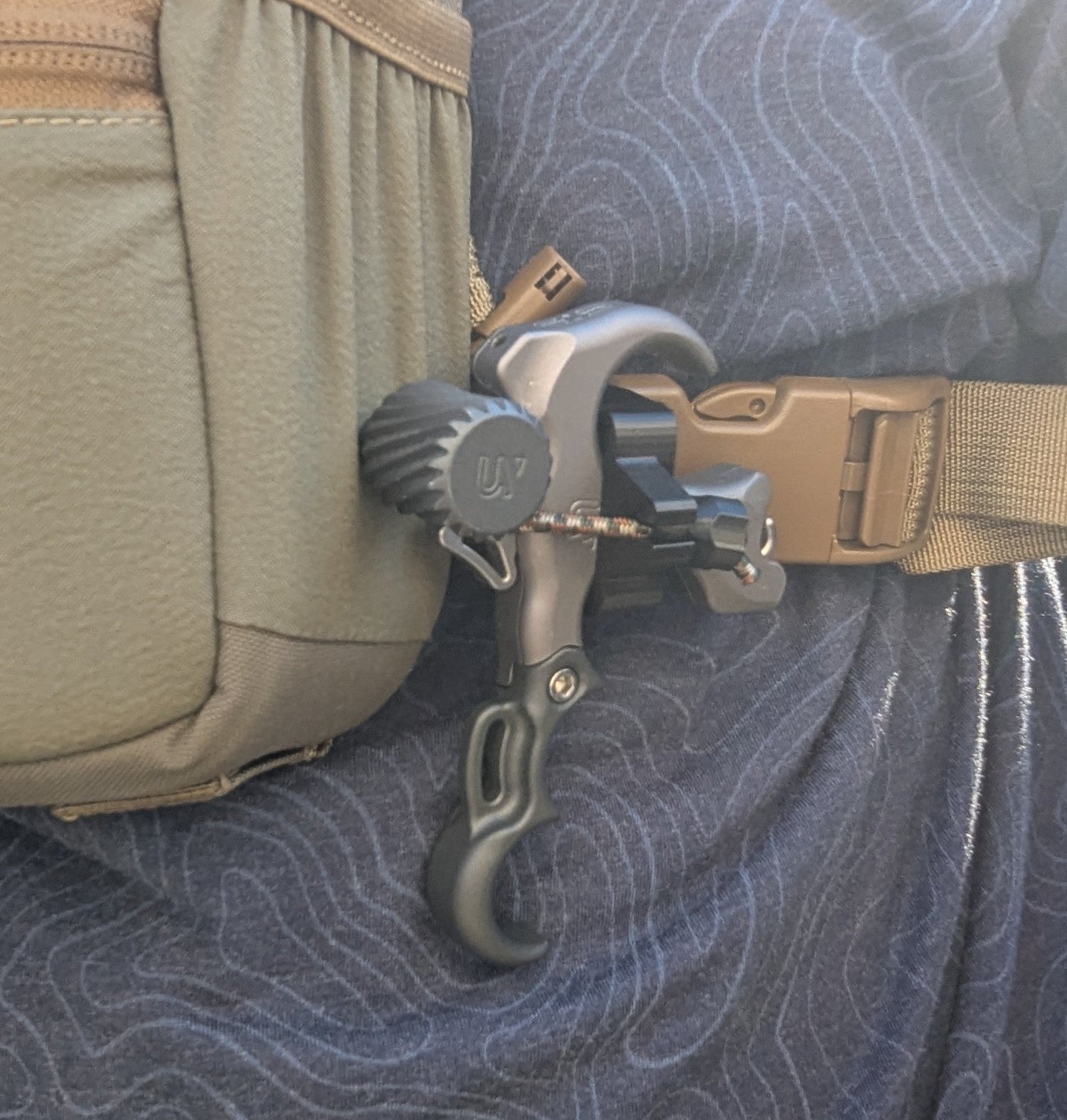 Archery release Molle holster for thumb releases by 3D Hunting Solutions, designed to attach securely to bow accessories.
