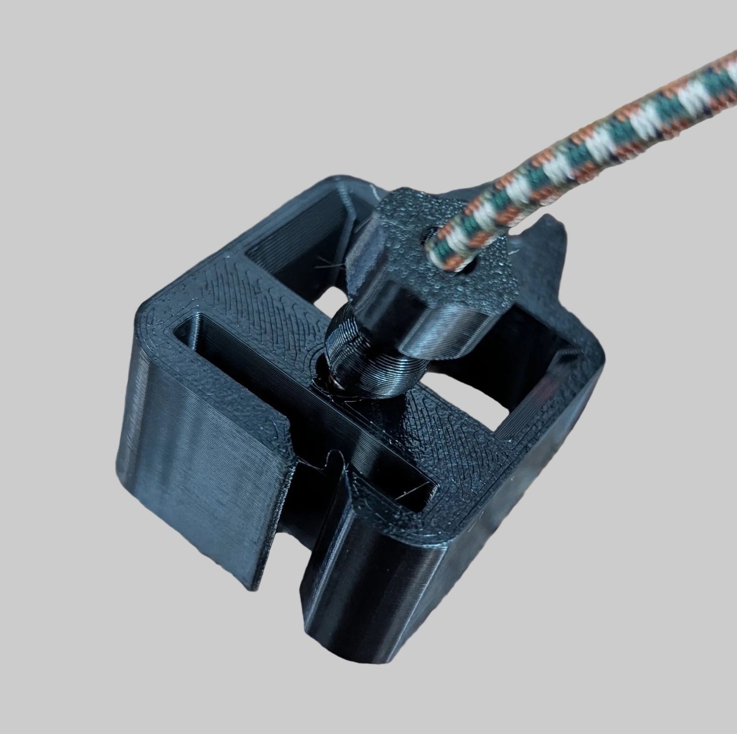 3D Hunting Solutions archery release molle holster for thumb releases, designed for secure attachment to bow accessories.