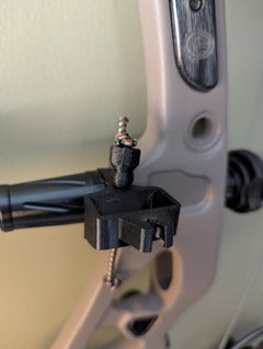 Archery release stabilizer holster for thumb releases, by 3D Hunting Solutions, designed for secure attachment to bow accessories.