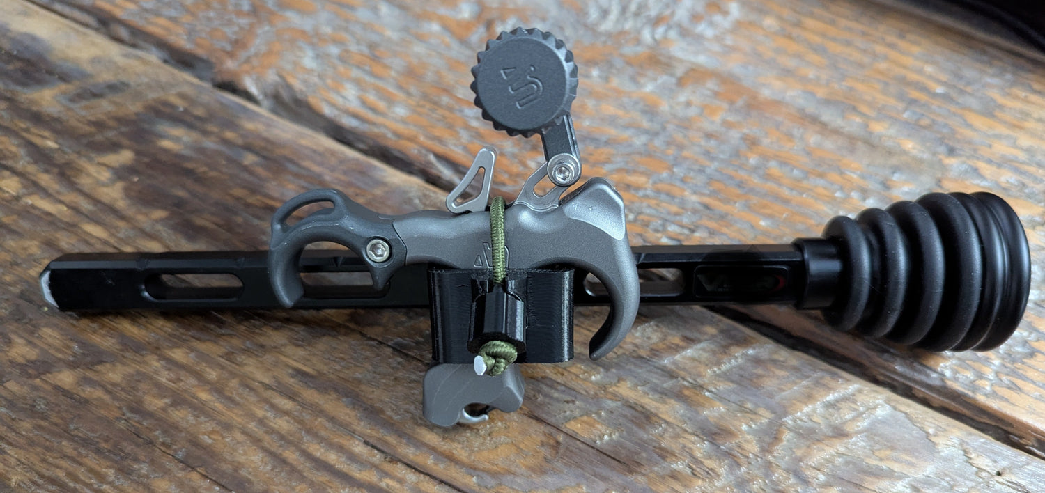 3D Hunting Solutions Bridge Lock Stabilizer Release Holster for thumb releases, a bow accessory with a secure holster design.