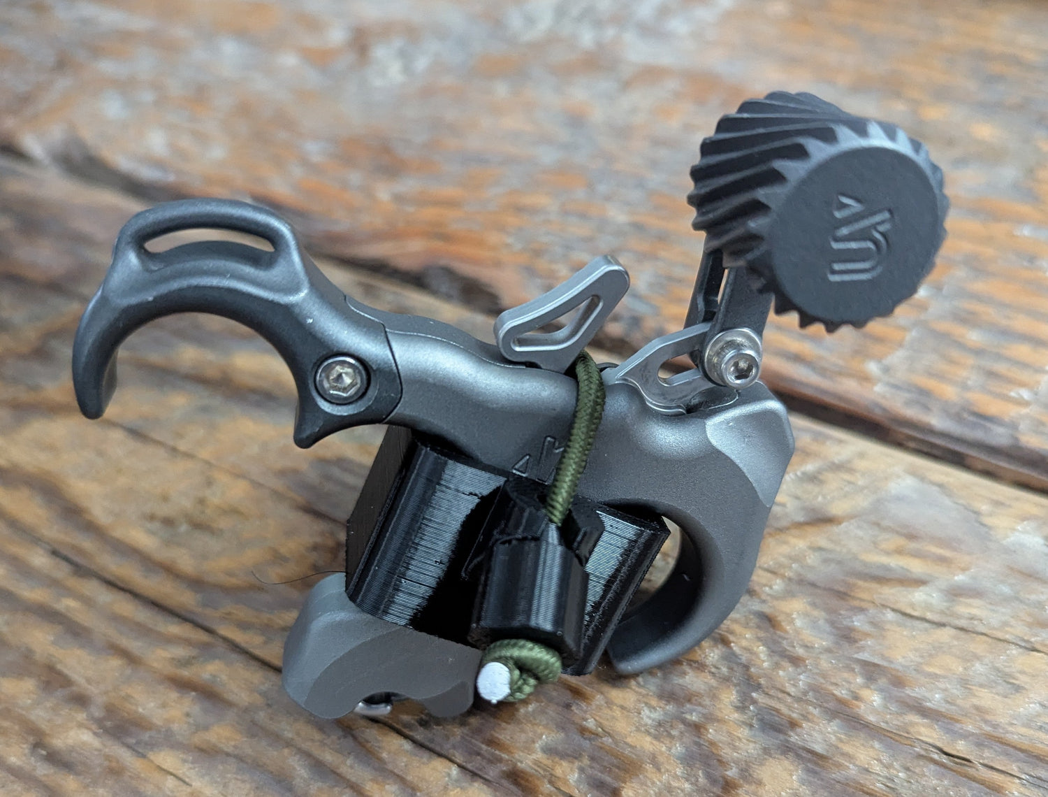 3D Hunting Solutions Bridge Lock Stabilizer Release Holster for thumb releases, designed for bow accessories, shown with a thumb release attached.