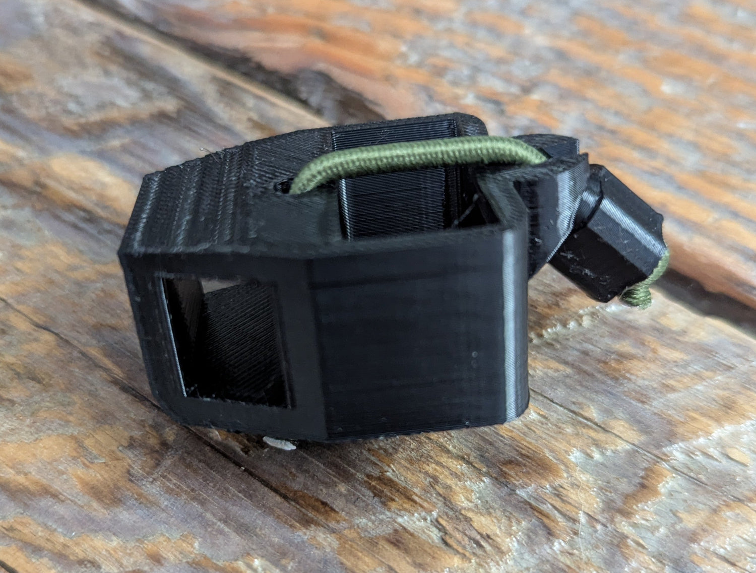 3D Hunting Solutions Bridge Lock Stabilizer Release Holster for thumb releases on bow accessories, showcasing secure attachment and design.
