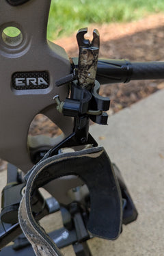 3D Hunting Solutions archery wrist release stabilizer holster for mobile and saddle hunting accessories with adjustable straps.