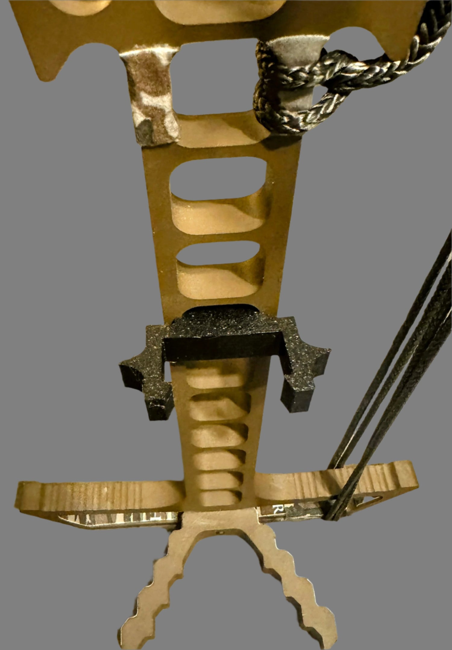 3D Hunting Solutions Trophyline Hyperlite Stick Wranglers for climbing sticks, showing a stack of climbing sticks with management system.