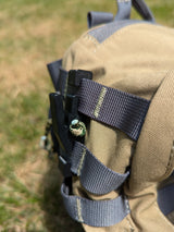 Climbing sticks Molle Reverser Clip by 3D Hunting Solutions featuring a durable Molle loop for secure attachment.