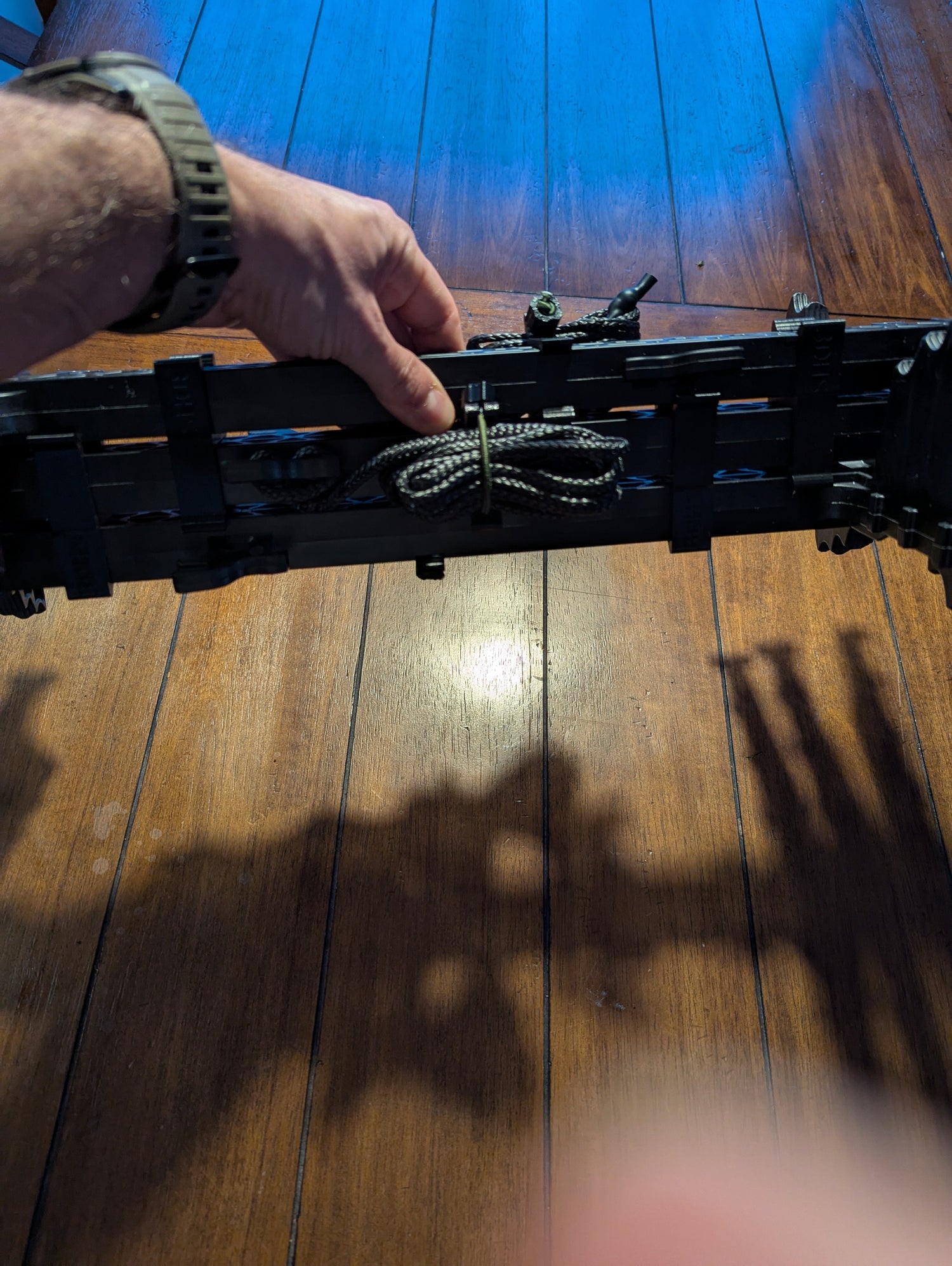 3D Hunting Solutions Latitude Carbon SS Climbing Stick Management System with two climbing sticks stacked together.