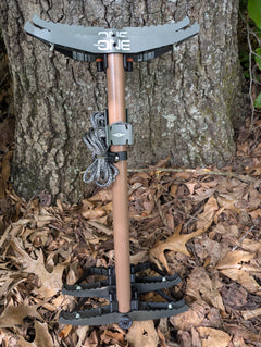 3D Hunting Solutions Tethrd One Stick Wranglers climbing stick stacking system with two climbing sticks for easy transport and management.