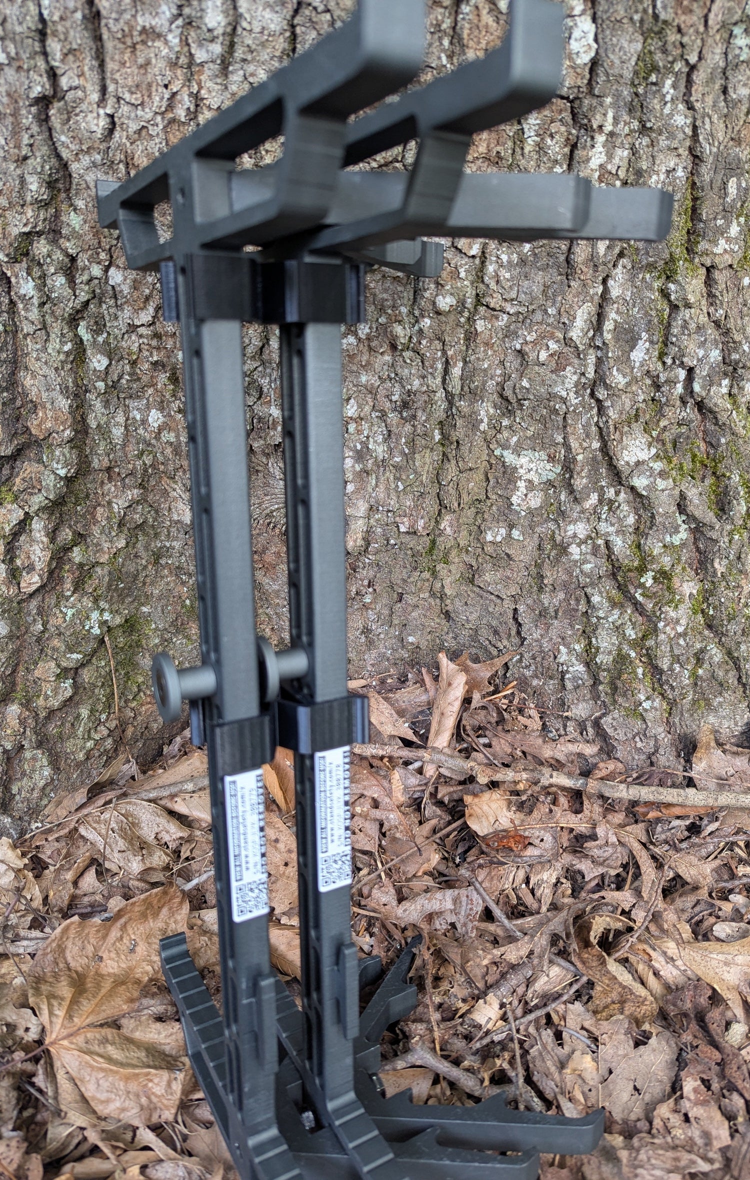 Set of 3D Hunting Solutions XOP Hydro Stick Wranglers climbing sticks for secure climbing stick management system with two stacked sticks.