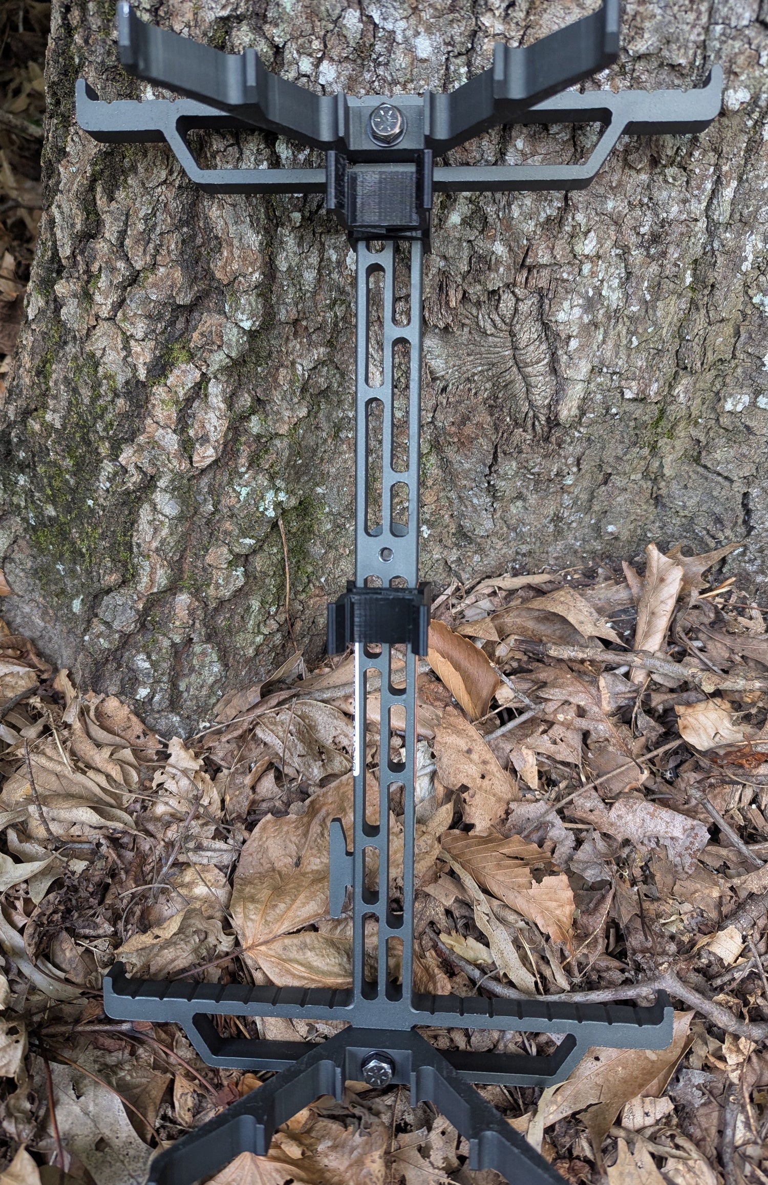 Set of XOP Hydro Stick Wranglers climbing stick management system by 3D Hunting Solutions, with two stacked climbing sticks.
