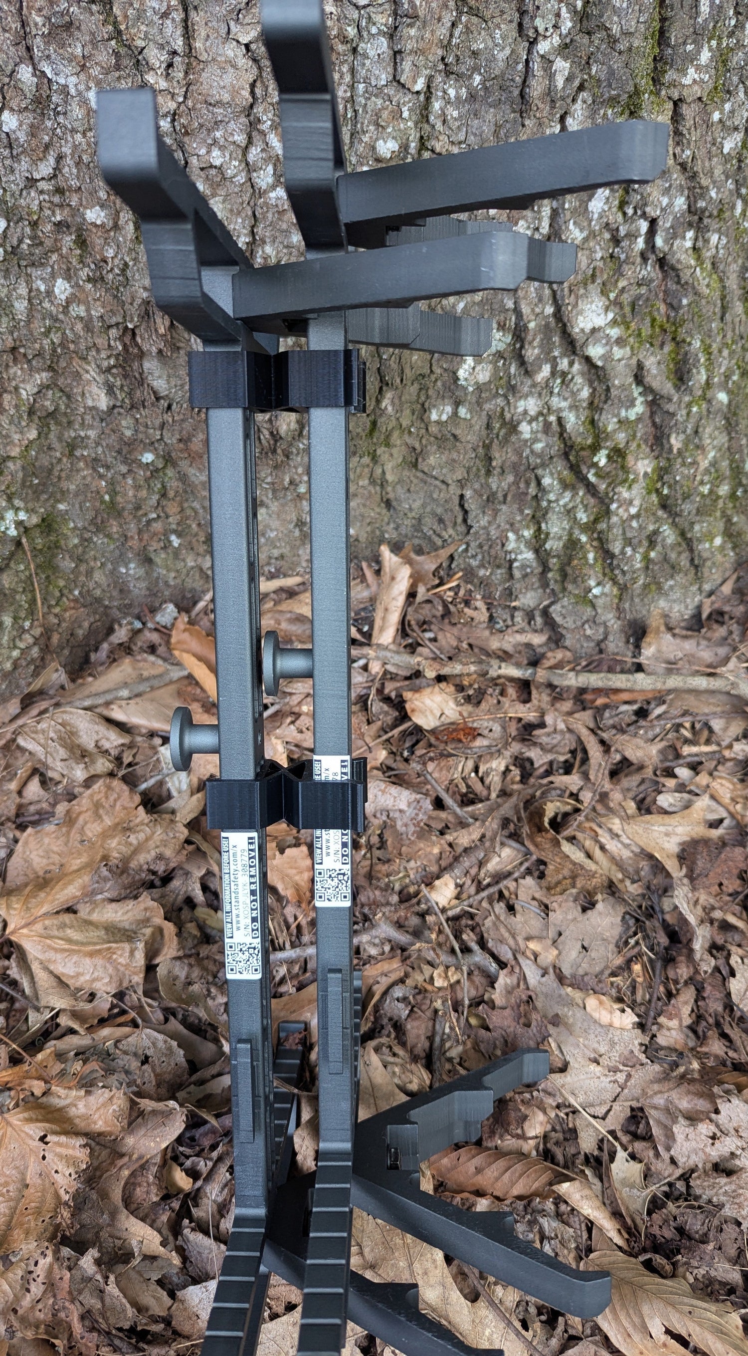 Two XOP Hydro Stick Wranglers climbing sticks from 3D Hunting Solutions, designed for easy climbing stick management and secure storage.