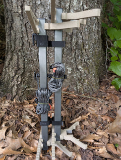 XOP X2 Stick Wranglers climbing stick management system for 3D Hunting Solutions climbing sticks, showing two stacked sticks with straps.
