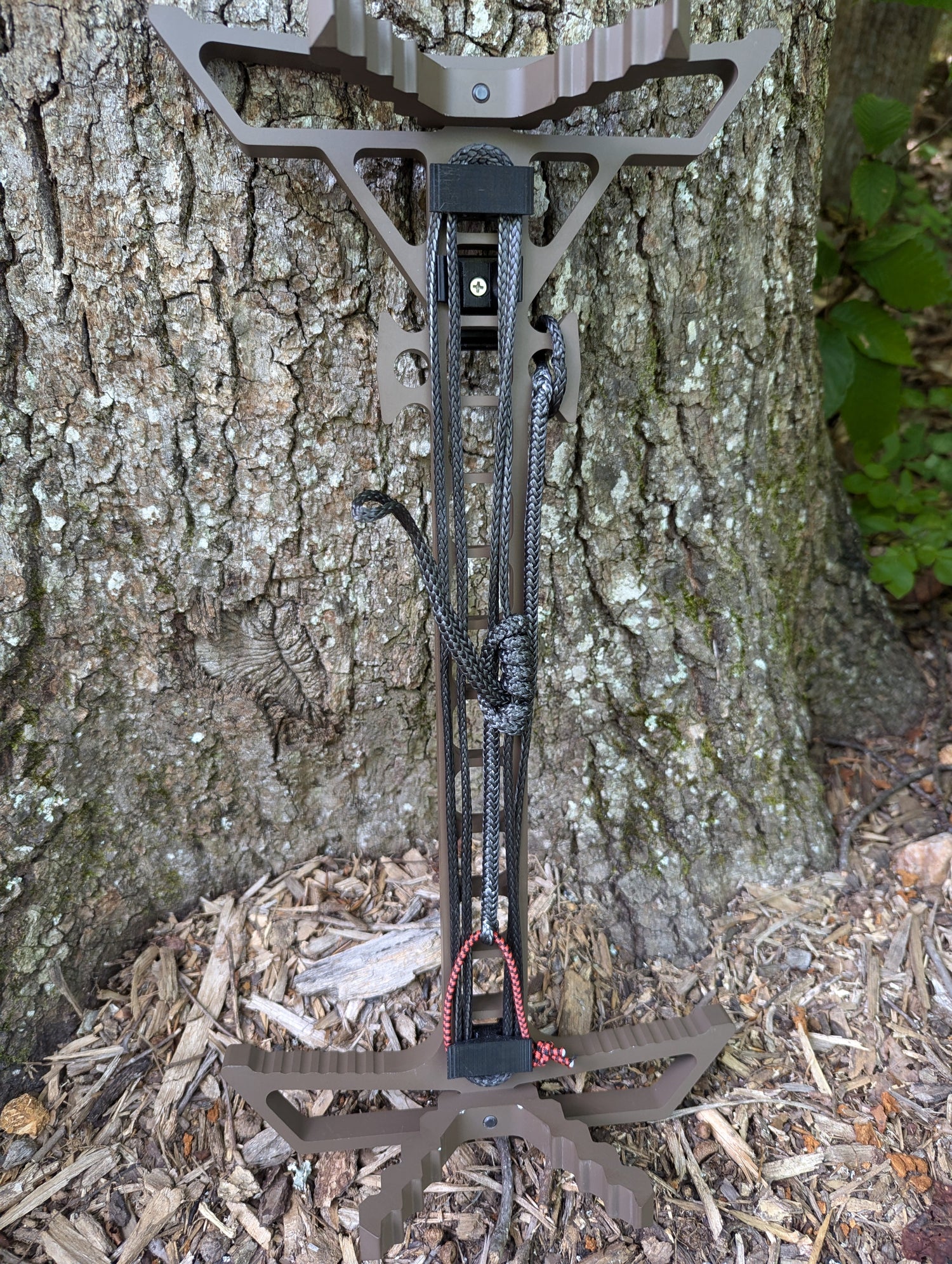 Two Trophyline Hyperlite Spool Bumpers on climbing sticks by 3D Hunting Solutions, designed for secure climbing and safety.