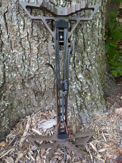 Two Trophyline Hyperlite Spool Bumpers on climbing sticks by 3D Hunting Solutions, designed for secure climbing and safety.