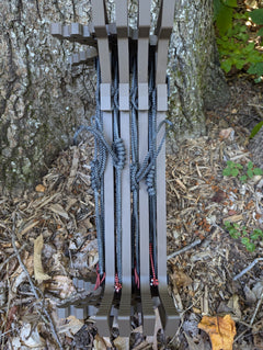 Climbing sticks with Trophyline Hyperlite Spool Bumpers from 3D Hunting Solutions, showing the textured grip and bumper details.