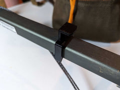 Climbing Stick Amsteel Spooler by 3D Hunting Solutions attached to climbing stick, used for organizing and spooling climbing rope.