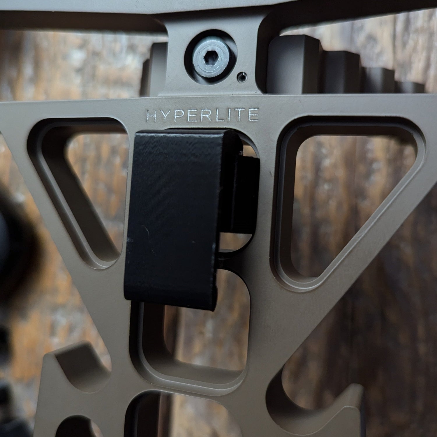 Trophyline Hyperlite Stick Caddy for saddle hunting, lightweight climbing stick accessory by 3D Hunting Solutions shown in image.