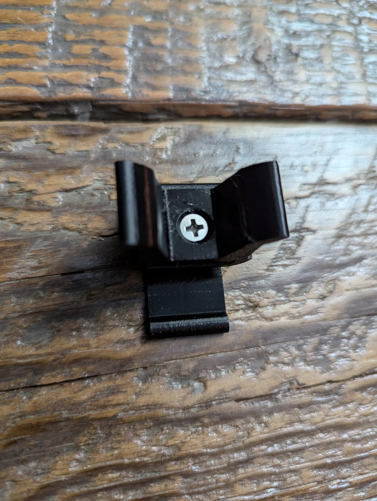 Trophyline Hyperlite Stick Caddy for saddle hunting, lightweight climbing stick accessory by 3D Hunting Solutions, mounted on a tree.