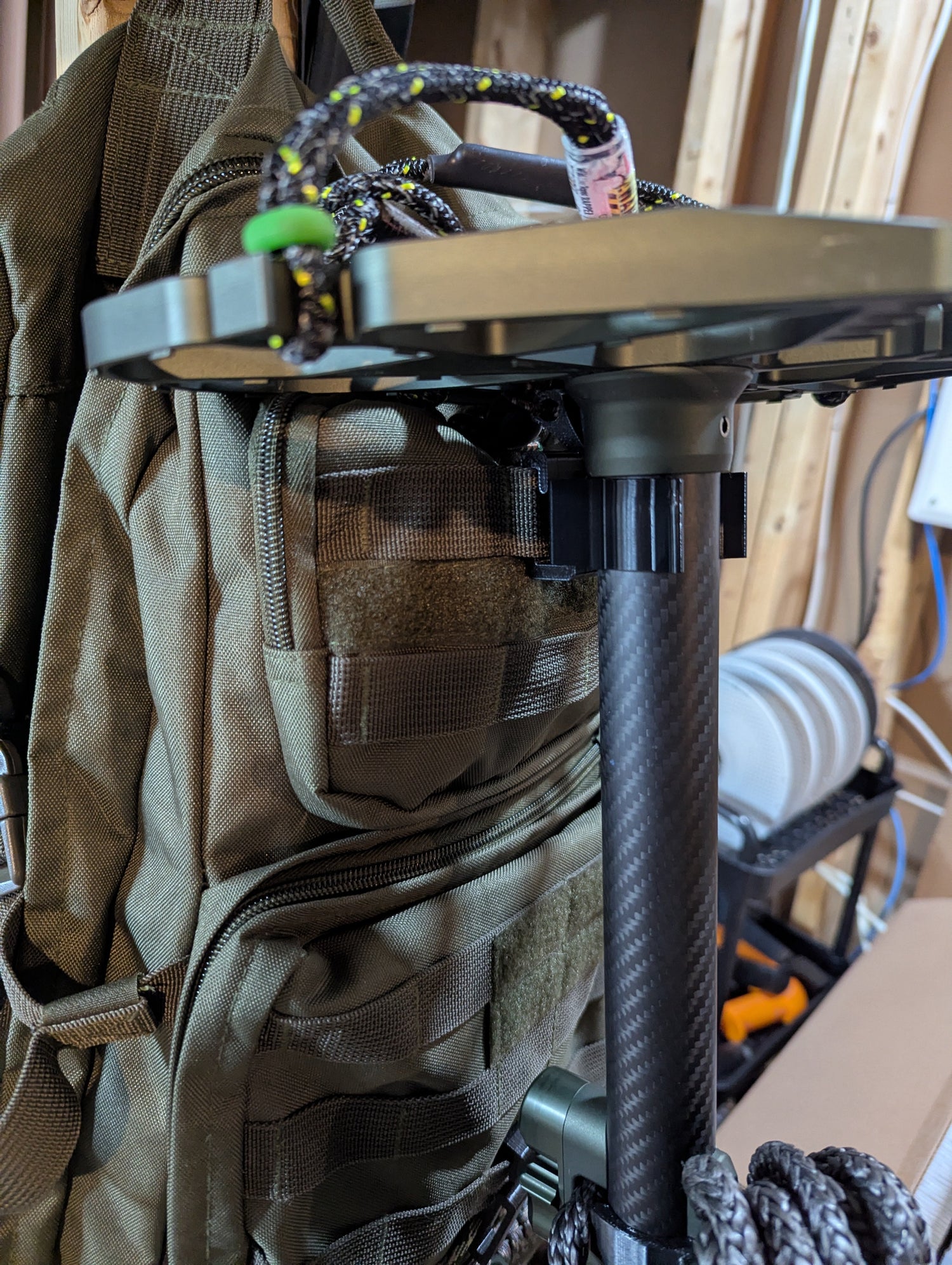 Arsenal X20 Solo Stick Molle Caddy for saddle hunting, 1.25-inch climbing stick by 3D Hunting Solutions, vertical position.
