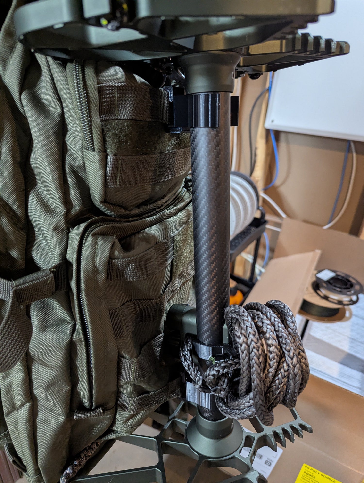 Arsenal X20 Solo Stick Molle Caddy climbing stick by 3D Hunting Solutions, 1.25-inch for saddle hunting, shown mounted vertically.
