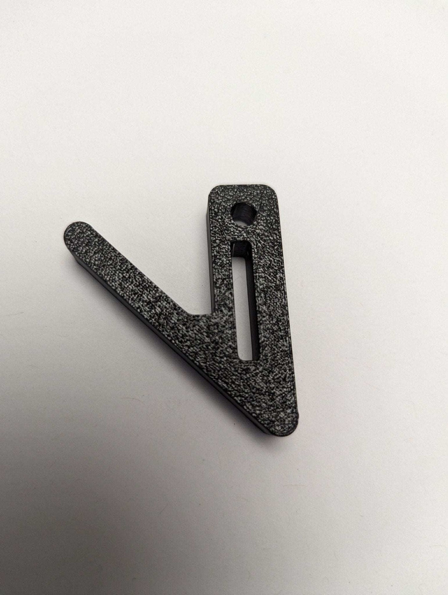 Angled gear hook for saddle hunting by 3D Hunting Solutions, designed for secure gear storage during outdoor hunting adventures.