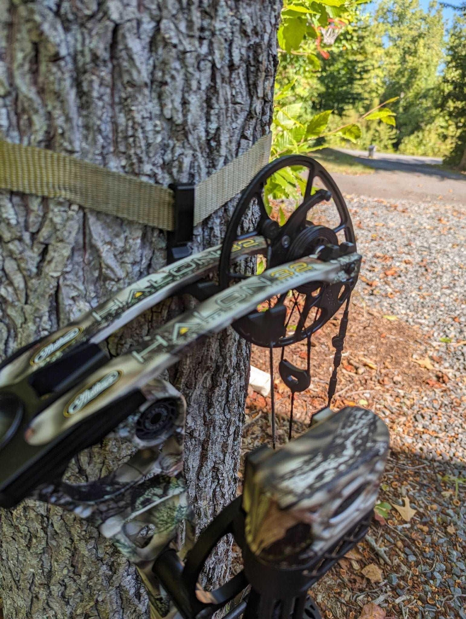 Gear strap bow hanger for saddle hunting by 3D Hunting Solutions, showing a durable strap attached to a hunting saddle.
