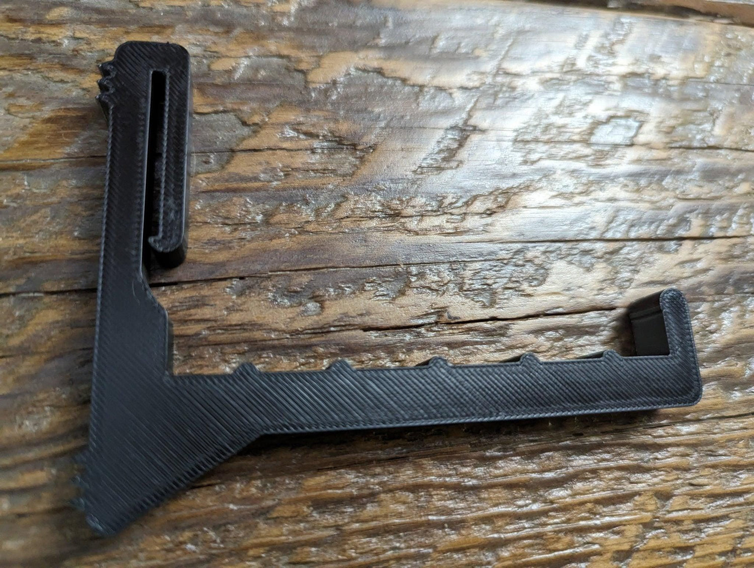3D Hunting Solutions bow hanger gear strap for saddle hunting, showing secure attachment and durable design for archery gear storage.